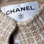 Beige Off-White Boucle Gold Buttoned Skirt Suit by Chanel - Le Dressing Monaco